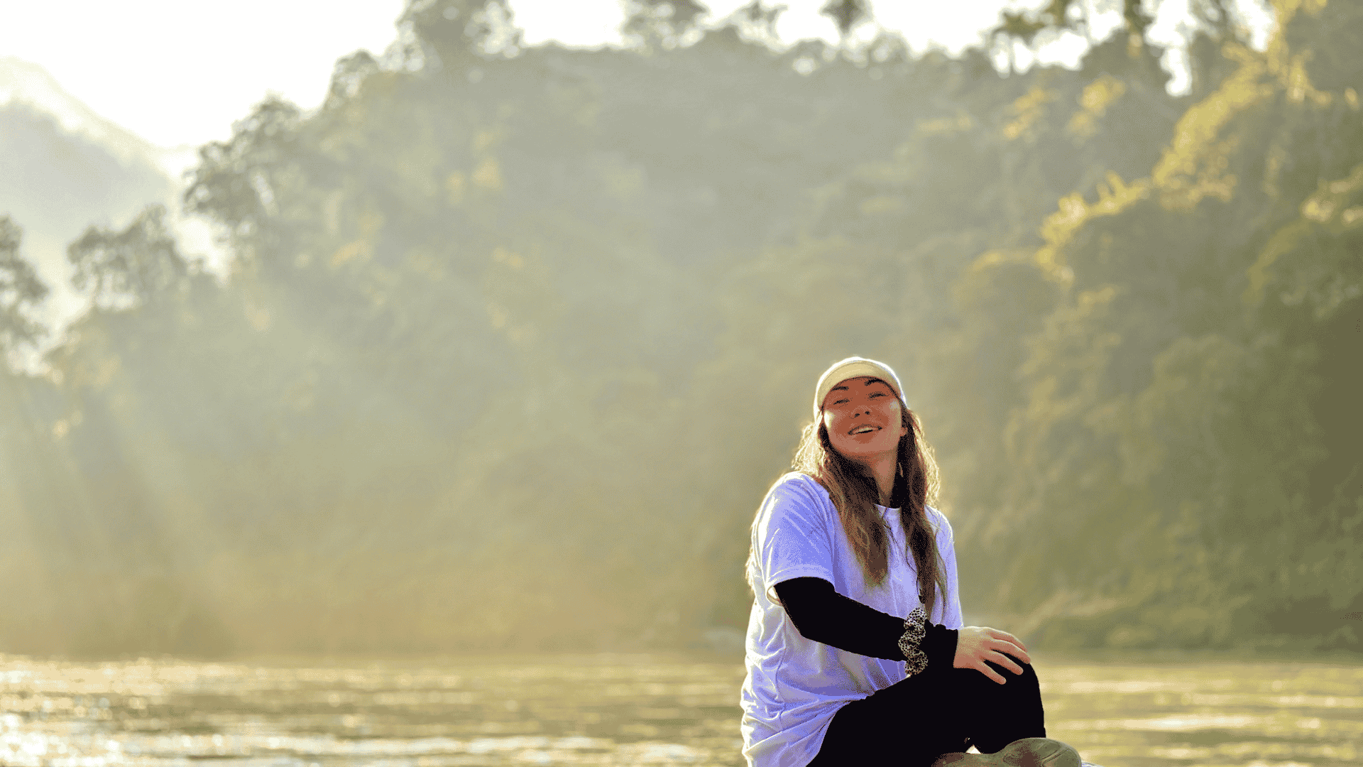 Student beside the Ganga in Rishikesh