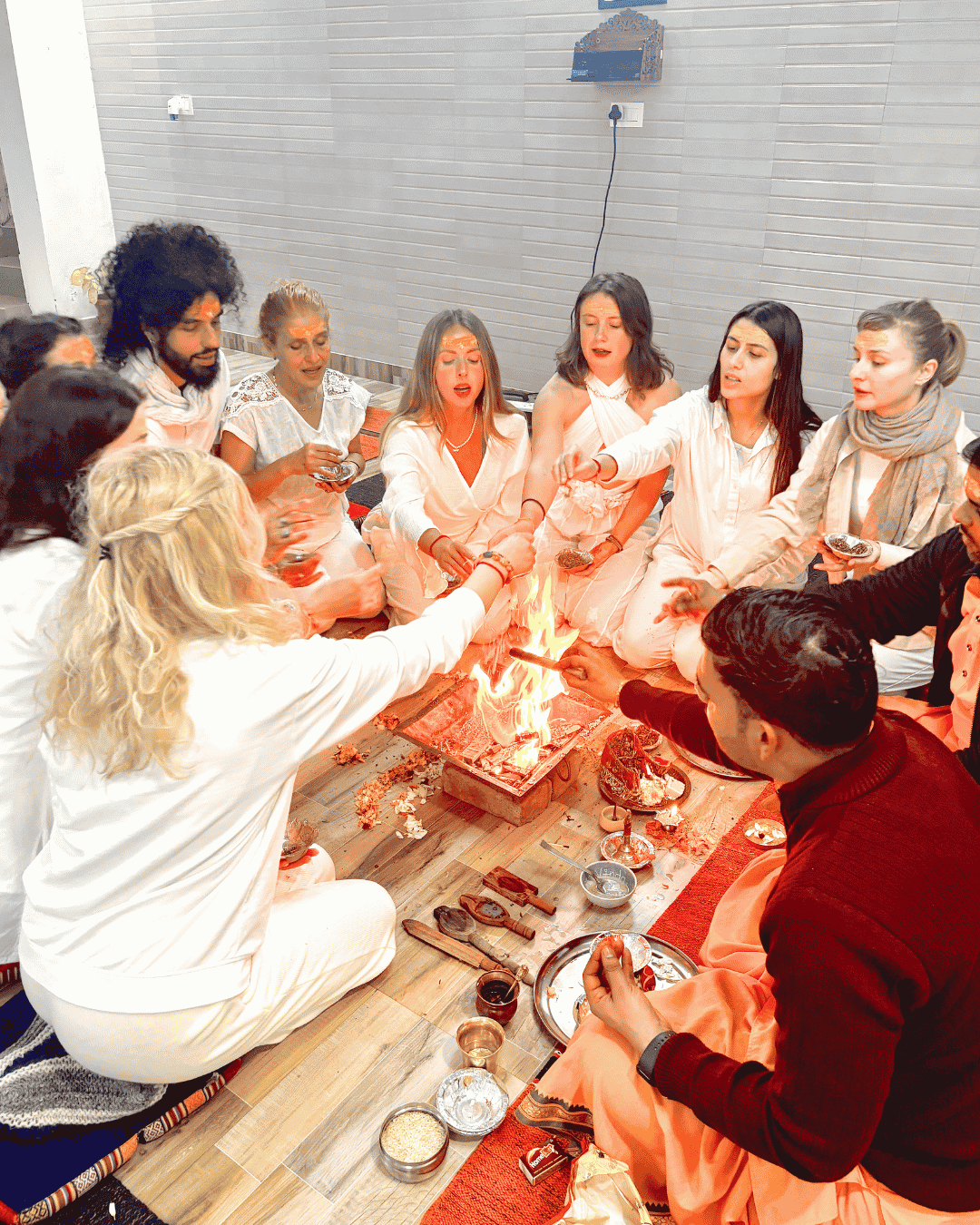 Yoga teacher guiding students at Ishavasyam Yoga School in Rishikesh